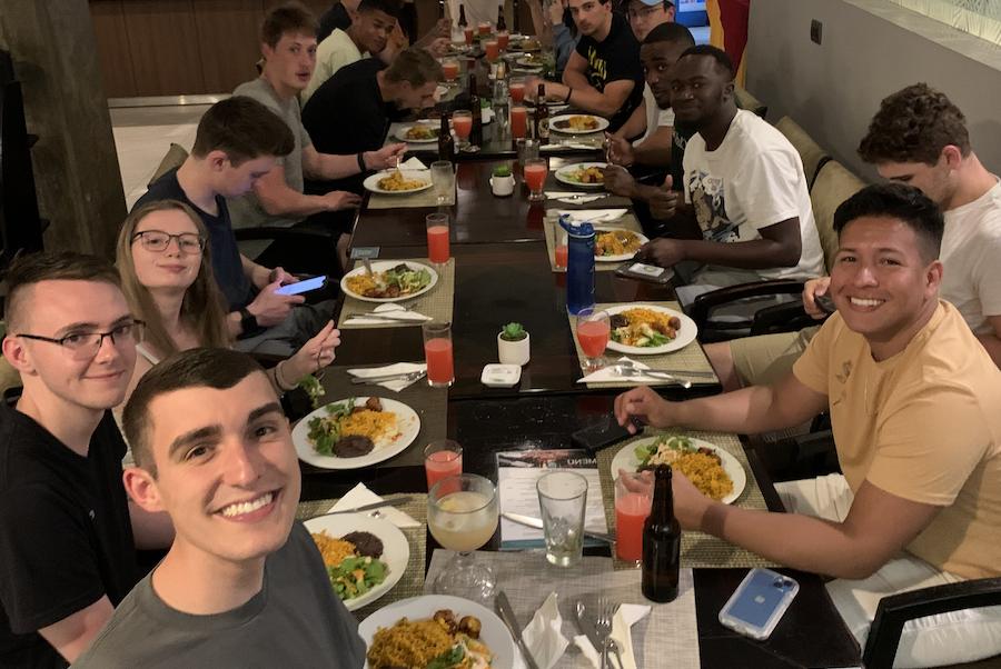 Clarkson University students share a meal in Costa Rica. 